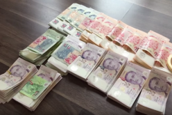 Người Việt bị phạt vì mang tiền vào Singapore không khai báo